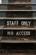 © Austockphoto - Vintage sign writing on an old set of stairs