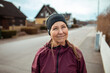 © Marko Geber - Portrait of a senior woman running and exercising in the suburbs