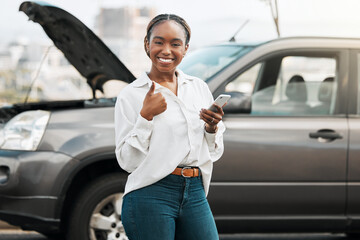 Car insurance, mobile or portrait of happy woman with thumbs up on road typing message for help. Smile, phone service or African driver by a stuck motor vehicle texting on social media or online