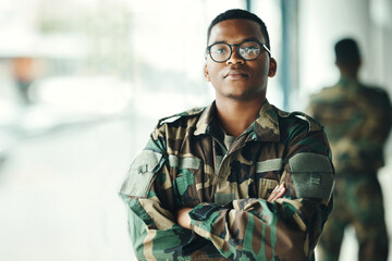 Confident soldier portrait, mockup and arms crossed in army building, pride and professional hero service. Military career, security and courage, black man in camouflage uniform at government agency.
