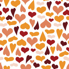 Seamless pattern of cute hearts of autumn colors on a white background. Wallpaper for season decoration, wrapping paper, clothing prints. Vector illustration.