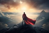 Fototapeta Natura - Businessman superhero with red cape standing and looking on the top of mountain landscape background