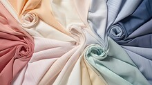 Assorted Cotton Fabrics In Pastel Colors Arranged In A Pinwheel Pattern