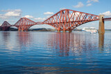 The Forth Bridge is a railway bridge across the Firth of Forth in Scotland. Is considered a symbol of Scotland, and is a UNESCO World Heritage Site. Designed by  Sir John Fowler and Sir Benjamin Baker