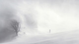 Fototapeta Fototapety z naturą - Man standing in blizzard. Lots of snow, severe weather and hard conditions.