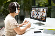 © Prostock-studio - Middle aged woman remote employee have online meeting with colleagues