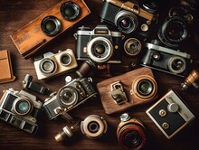 Vintage Cameras On A Wooden Table. View From Above. Close-up.