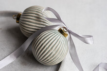 Christmas Baubles On Grey Surface