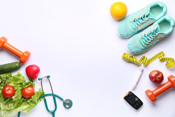 Glucometer, healthy food, stethoscope and sneakers on white background. Diabetes concept