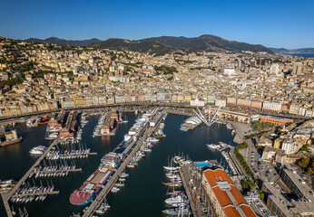 Wall Mural - The drone aerial view of old port and downtown district of Genoa, Italy. 