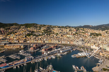 Wall Mural - The drone aerial view of old port and downtown district of Genoa, Italy. 