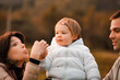 © Giulio_Fornasar - Joyful child, hay bale, mother's grassy jests