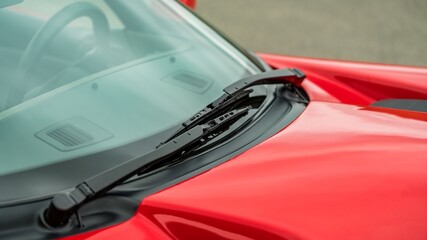 Wall Mural - Windshield wipers on a red car