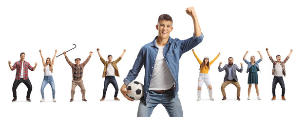 Canvas Print - Male teenager with a football and group of people cheering in the back