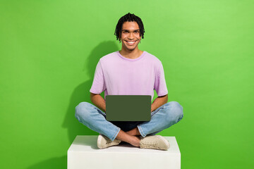 Poster - Photo of cool positive guy wear pink t-shirt communicating modern device isolated green color background