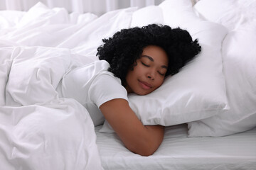 Poster - Beautiful young woman sleeping in soft bed