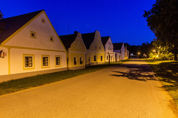 Sticker - Evening view of traditional houses of rural baroque style in Holasovice village, Czech Republic