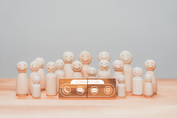 Poster - Wooden doll team standing with text contact icons ( email, address, live chat, telephone ) sign. Customer service, helpdesk advice online support. Contact us or Customer support hotline.