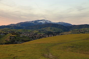 Wall Mural - Sunset over the East Bay hills with snow on Mt Diablo in the background