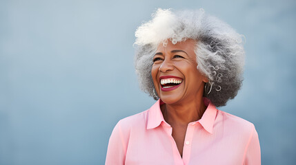 Wall Mural - portrait of a senior woman, closeup of a joyful senior afro American woman with elegant grey hair, radiantly smiling to showcase her impeccable teeth for a dental advertisement