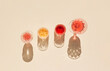© Suzana - Creative pattern of glasses with red wine, cocktail and champagne on a sunny day. Party concept on beige background. Vintage style, flat lay.