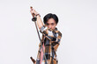 A young asian man drawing out his a ceremonial katana. A sword enthusiast feeling like a samurai warrior. Isolated on a white background.