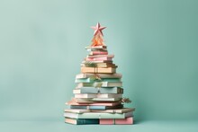 On A Cold Winter's Night, A Brightly Decorated Pastel Christmas Tree Towers Above A Stack Of Books Topped With A Shining Star, Evoking A Sense Of New Beginnings And Hope For The Upcoming Year