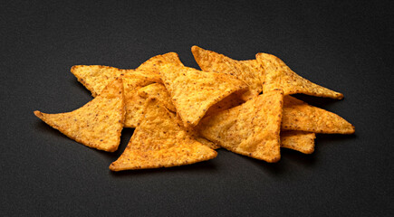 Poster - Corn chips, hot Mexican nachos isolated on black background