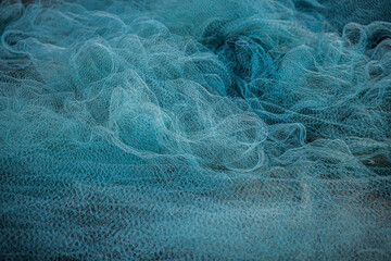blue fishing net, fisherman hunting tools, net rope texture / pattern net / abstract / background.