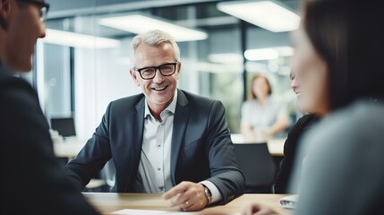 Wall Mural - Senior businessman having a discussion with his team in an office. generative AI