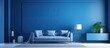 © AkuAku - Blue room with modern interior and furnishings on a blue background ing