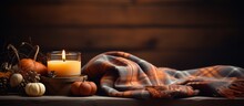 Close Up Of A Cozy Autumn Composition With Candles Mini Pumpkins And A Warm Knitted Plaid On A Wooden Windowsill Creating A Dark And Low Key Atmosphere In A Cozy Home Fall Colors Add To The