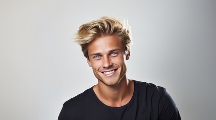 portrait of young handsome hipster man with blonde hair smiling and looking at camera over white bac