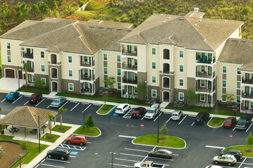 Wall Mural - View from above of apartment residential condos in Florida suburban area. American condominiums as example of real estate development in USA suburbs