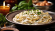 © tong2530 - Fettucini Alfredo dinner with creamy white sauce and herbs on table. Generative Ai