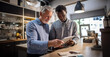 © GustavsMD - Coffee Shop Owner and inspector with tablet computer taking inventory in a Cozy Cafe. Successful Restaurant Manager Browsing Internet and Accepting Online Take Away Orders