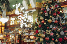 Decorated Christmas Tree In Supermarket.store Counters In Premium Store. Shopping Concept
