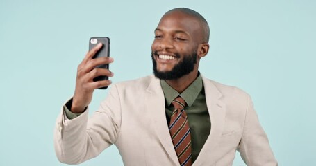 Aufkleber - Business, video call and black man with a smartphone, greeting and accountant on a blue studio background. African person, happy employee and investor with a cellphone, hello and wave with connection