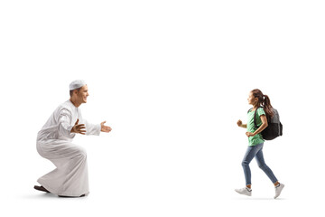 Canvas Print - Child running towards a man in traditional muslim clothes