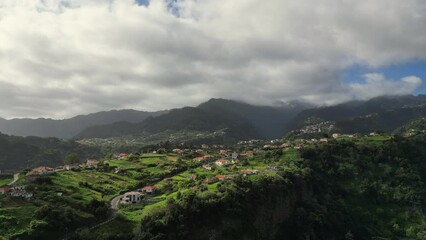 Wall Mural - Beautiful aerial footage in Penha d'Águia rocks and local villages area one of Madeira's most outstanding geological symbols