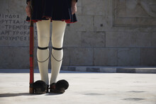 Legs Of Greek Presidential Guardsman With Rifle; Athens, Attica, Greece
