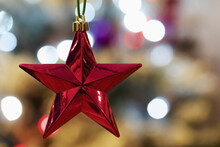 Red Christmas Tree Star With Bokeh Lights; London, England