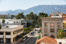 Afternoon sunlight shines on the historic buildings of the downtown skyline in Pasadena, California, USA.