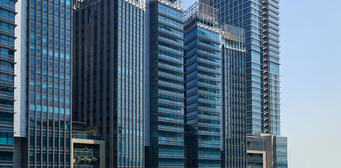 Wall Mural - Modern office skyscrapers ,high rise buildings with glass facades.