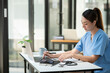 © Thitisak - Female nurse doctor Working in a hospital or clinic