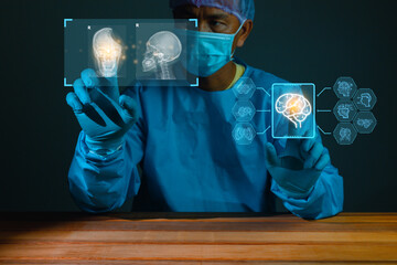 Doctor attentively examines the MRI scan of the patient.