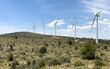 Wind turbine in mountains. Eolic park windpower. Wind farm or New Wind green energy. Wind turbines alternative energy. Windmill power clean electricity generation in Viver, Castellón, Caudiel, Spain