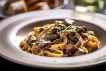 Tagliatelle With Sausage And Porcini, Pasta With Sausage And Summer Cep Mushroom.