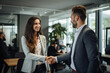 © GustavsMD - Happy mid aged business woman manager handshaking at office meeting. Smiling female hr hiring recruit at job interview, bank or insurance agent, lawyer making contract deal with client at work