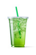 Green drink in a plastic cup isolated on a white background. Take away drinks concept